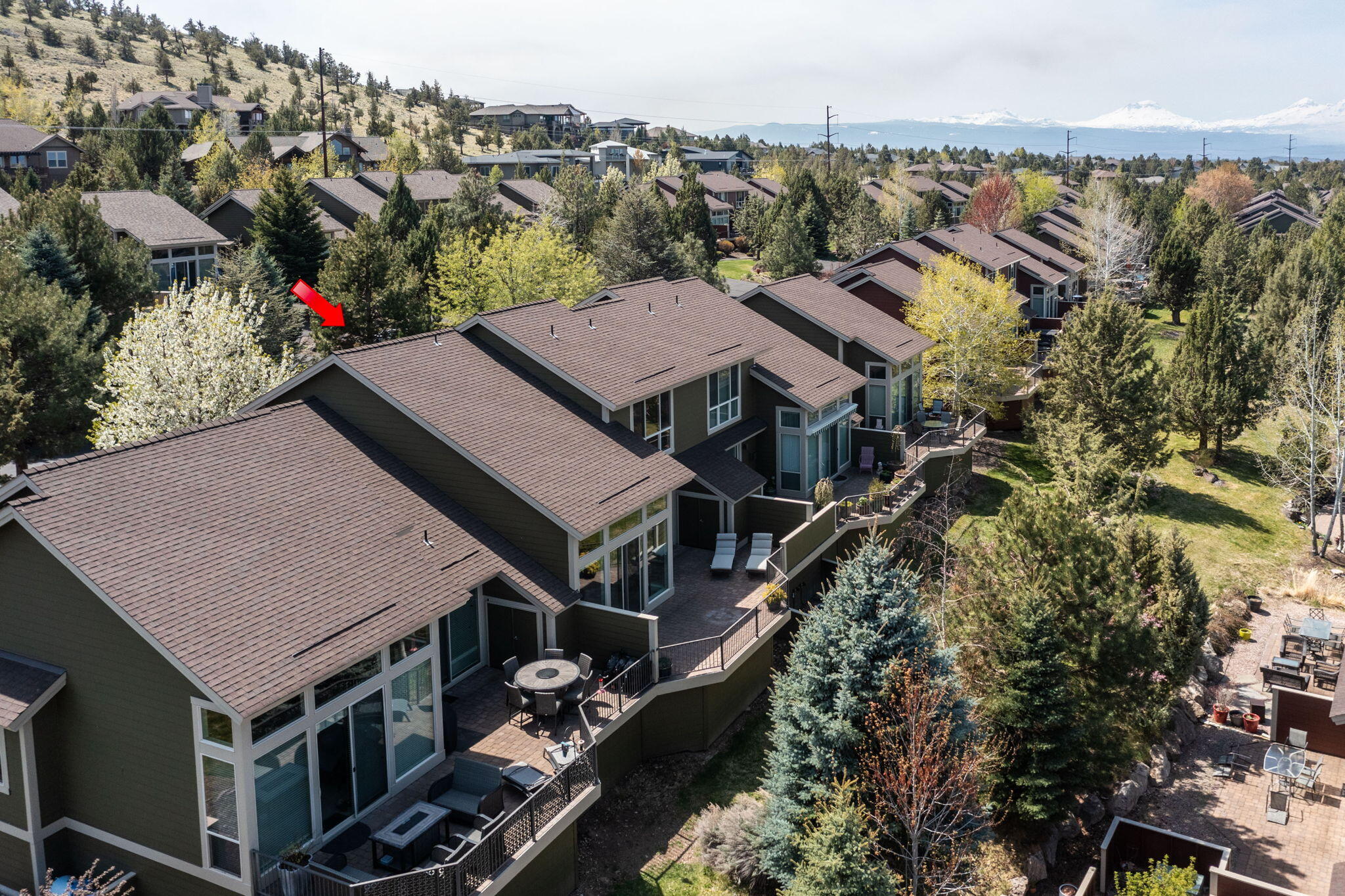 10870 Village Loop Redmond, OR 97756 - Photo 27 of 35 an aerial view of multiple houses with a yard