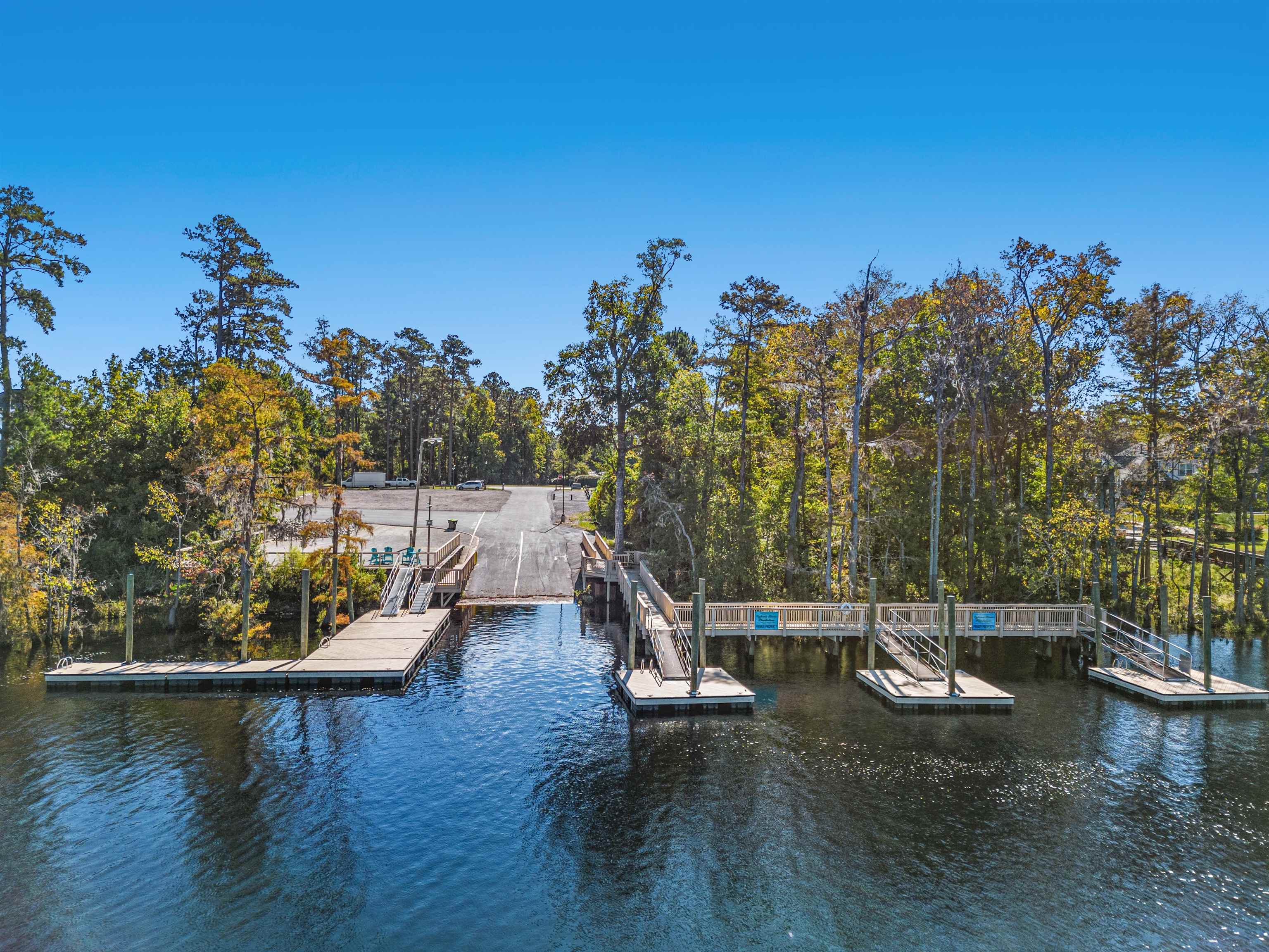 411 Chamberlin Road Myrtle Beach, SC 29588 - Photo 38 of 40 Dock featuring a water view