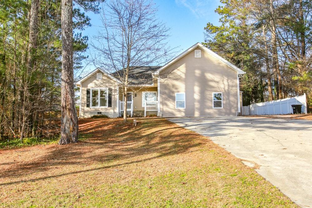 120 Fairfield Road Villa Rica, GA 30180 - Photo 1 of 1 a view of a house with snow on the background