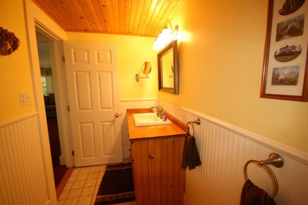 37 Back Narrows Road Boothbay, ME 04537 - Photo 14 of 20 The bathroom, with fiberglass shower...