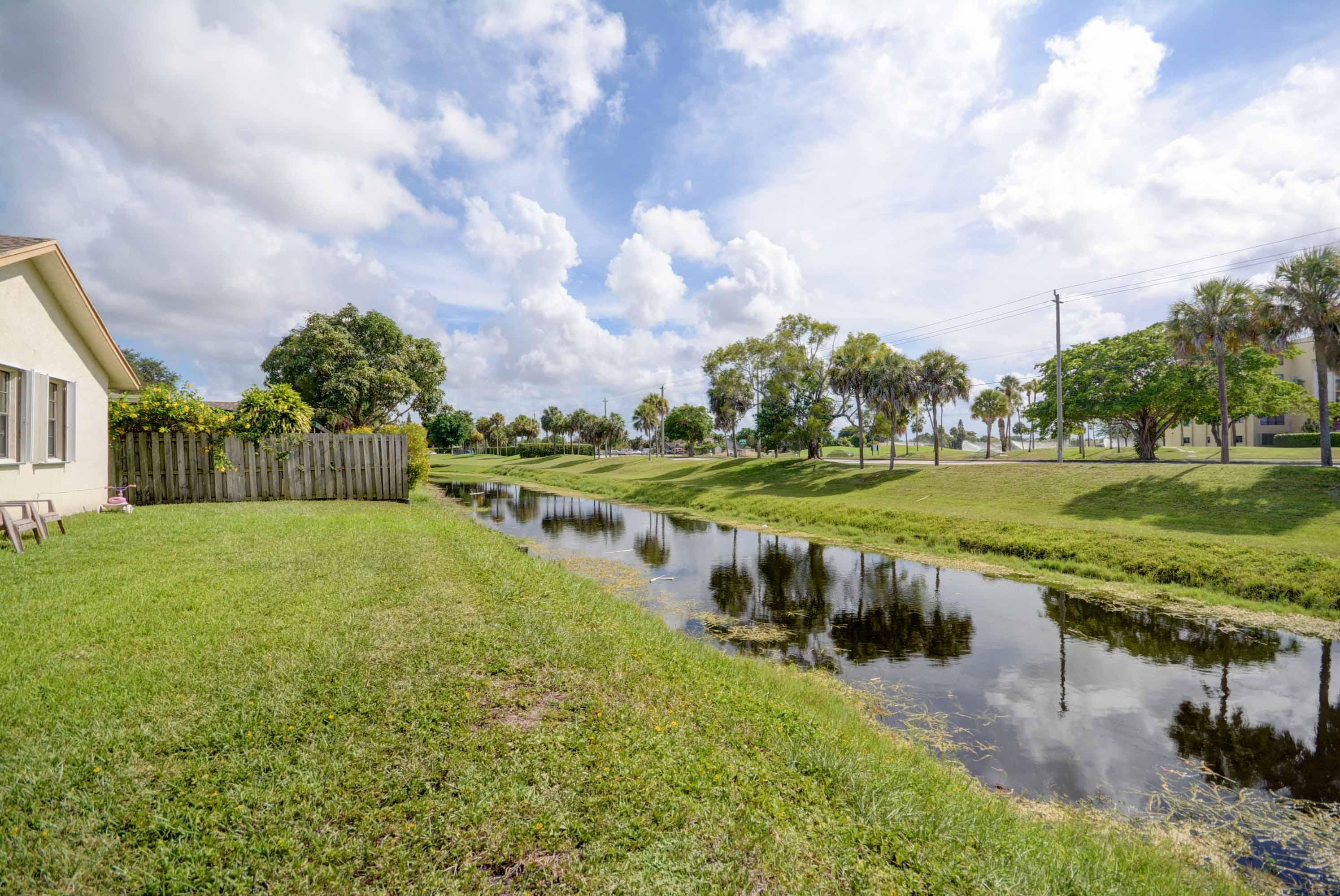 22953 Southwest 56th Avenue Boca Raton, FL 33433 - Photo 23 of 24 Exterior/ Canal