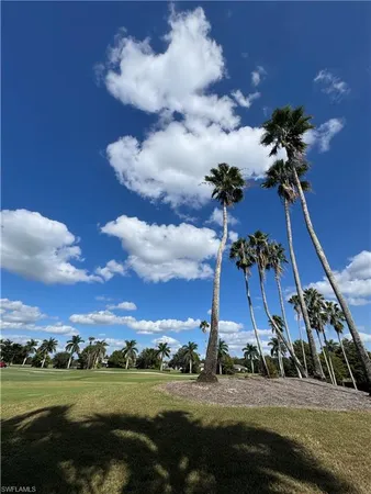 a view of a building with a big yard