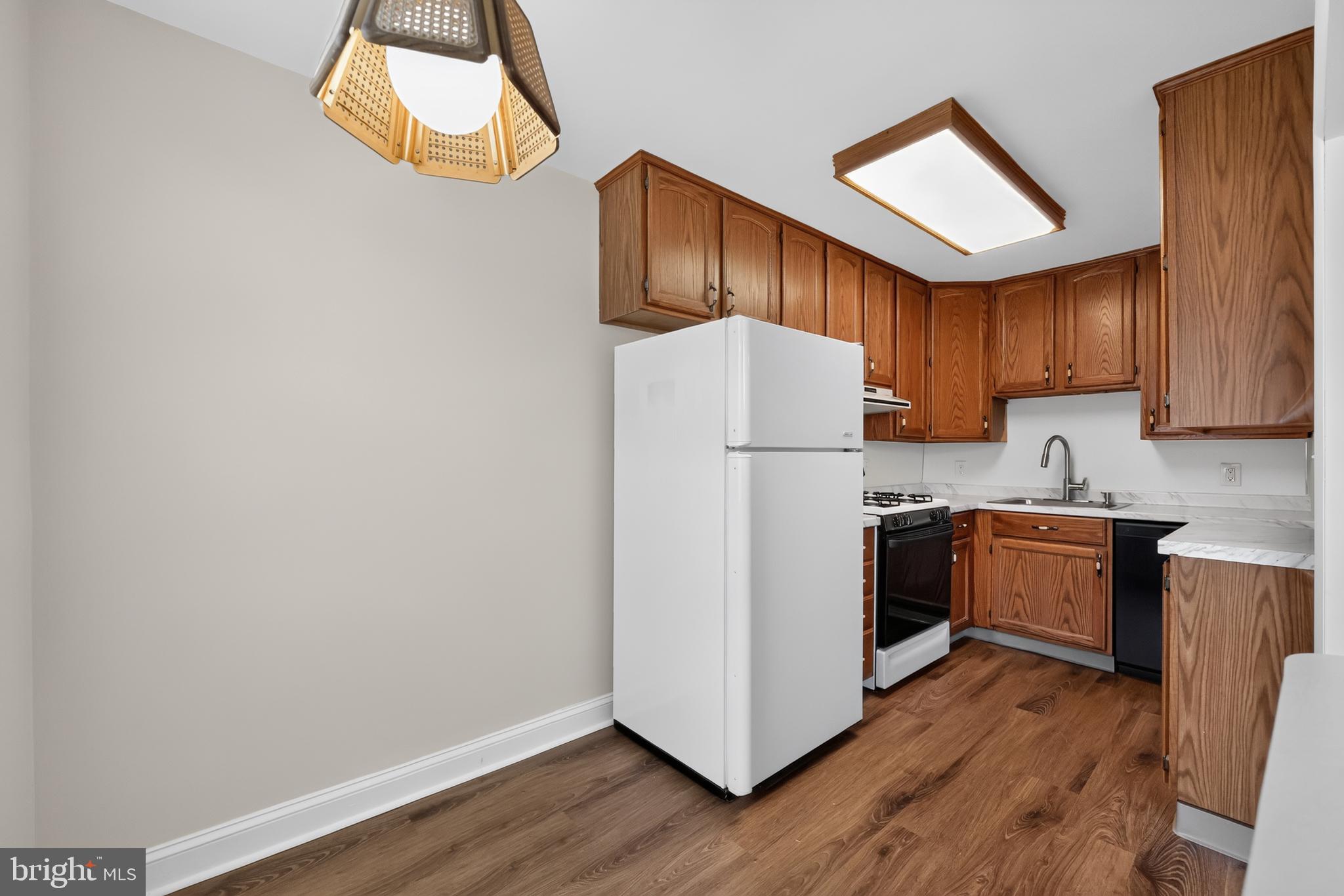 256 Cambridge Road Clifton Heights, PA 19018 - Photo 13 of 30 Modern kitchen with warm wood accents.