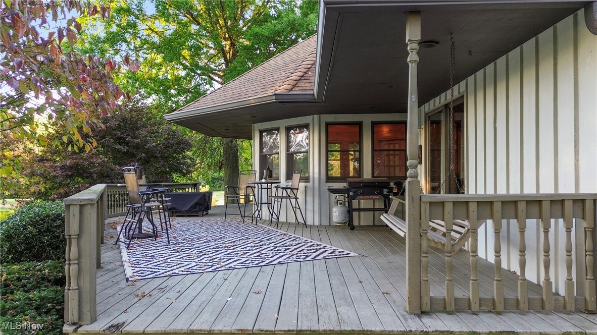 3804 Ridge Road Cortland, OH 44410 - Photo 16 of 44 Wooden deck featuring outdoor dining space