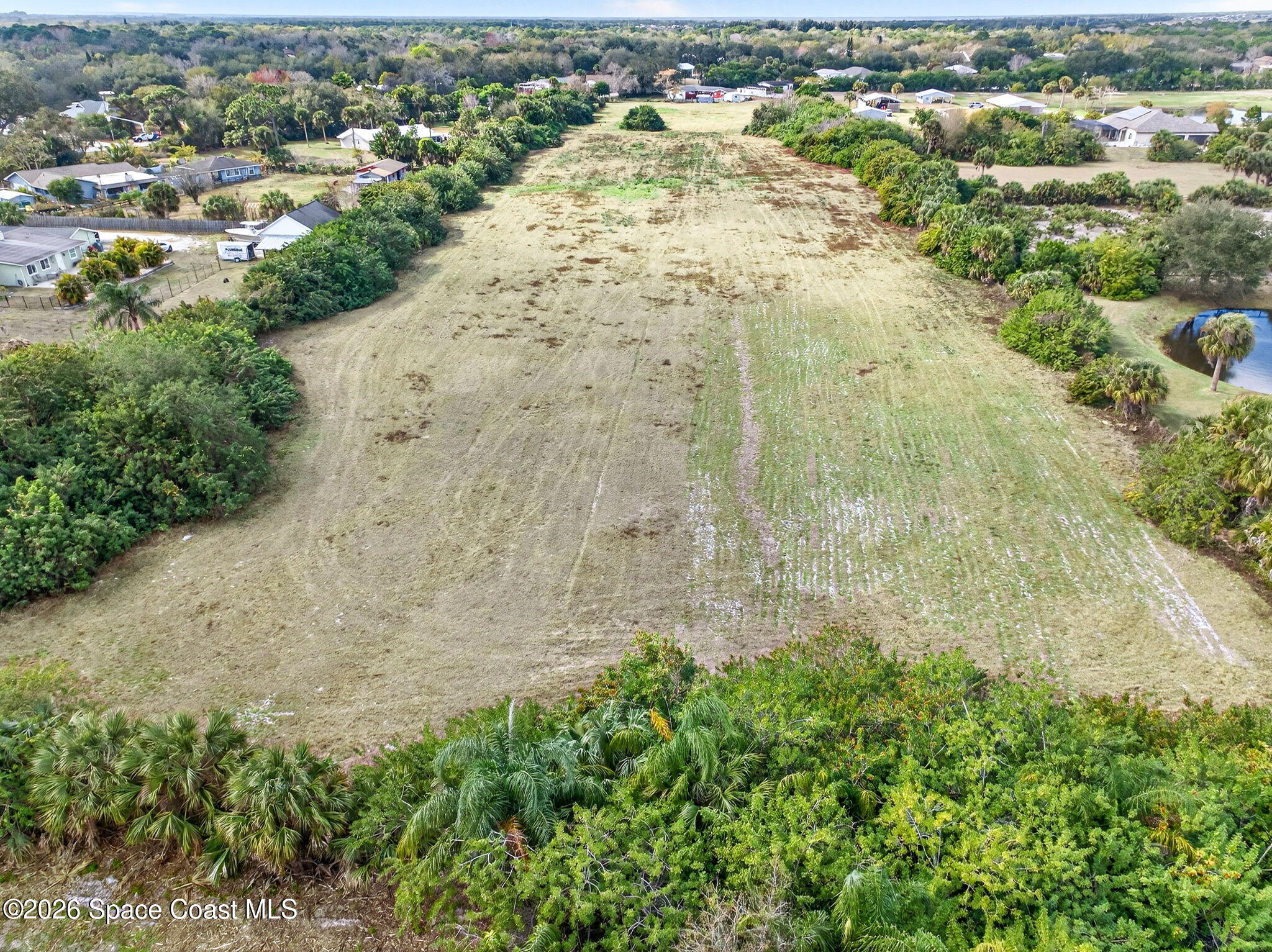 3825 Turtle Mound Road Melbourne, FL 32934 - Photo 9 of 19 an aerial view of residential house with outdoor space