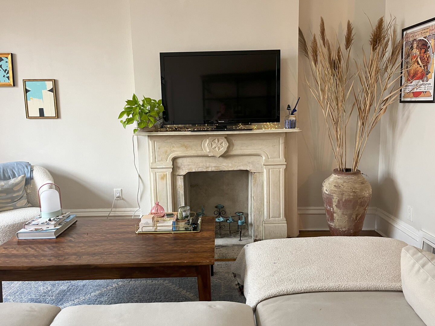 Undisclosed Address Chicago, IL 60622 - Photo 5 of 17 a living room with furniture a fireplace and a flat screen tv