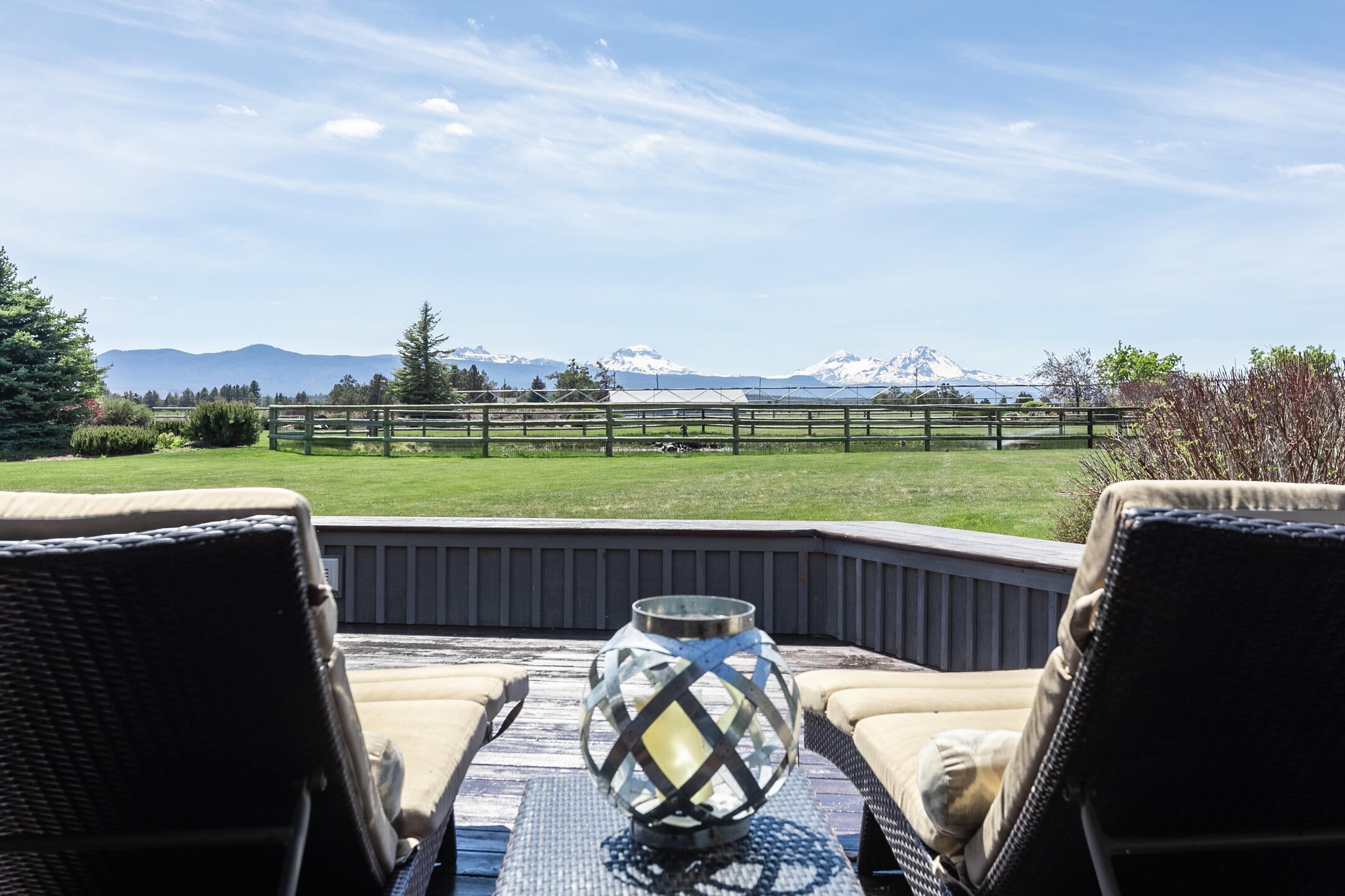 65105 Quail Farm Road Bend, OR 97703 - Photo 8 of 27 Large Deck overlooking the mountains and pond! Wonderful for entertaining!