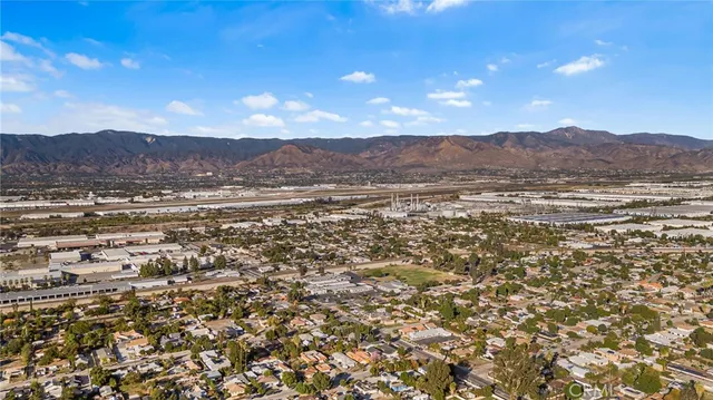 a view of an ocean and a mountain