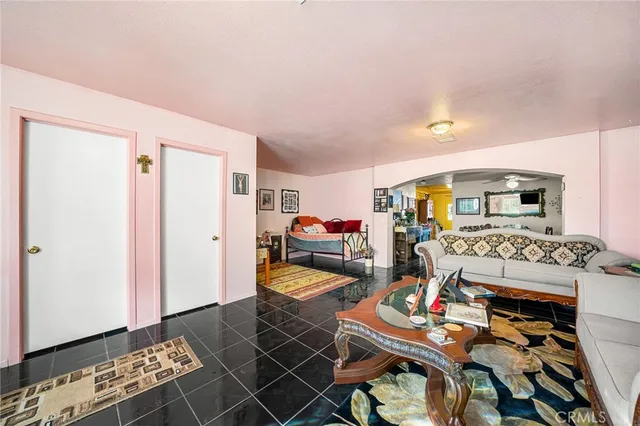 a bed room with furniture and a window