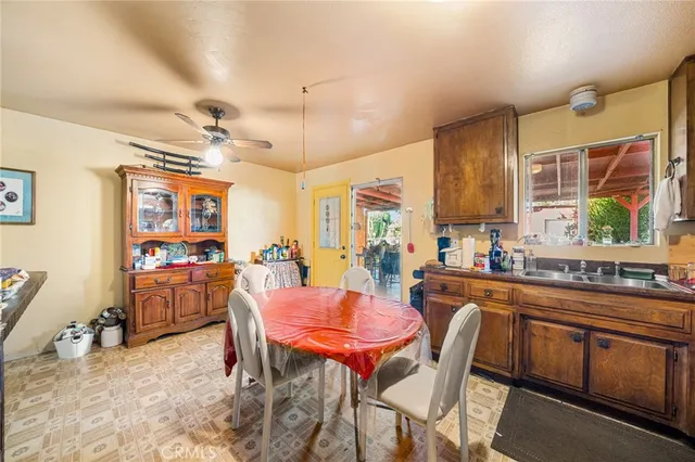 a view of a kitchen and dining area
