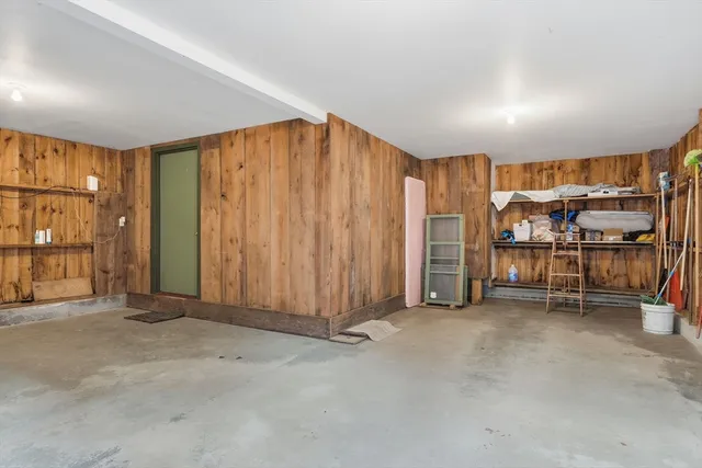 a big yard with lots of green space and plants