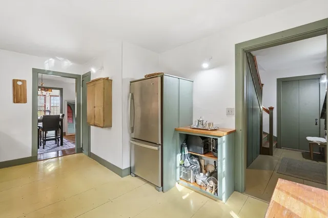 a kitchen with stainless steel appliances a refrigerator and a sink