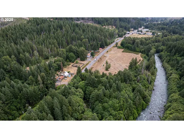 a open area with mountains in the background