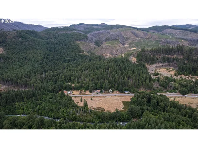 a kitchen view with mountains in the background