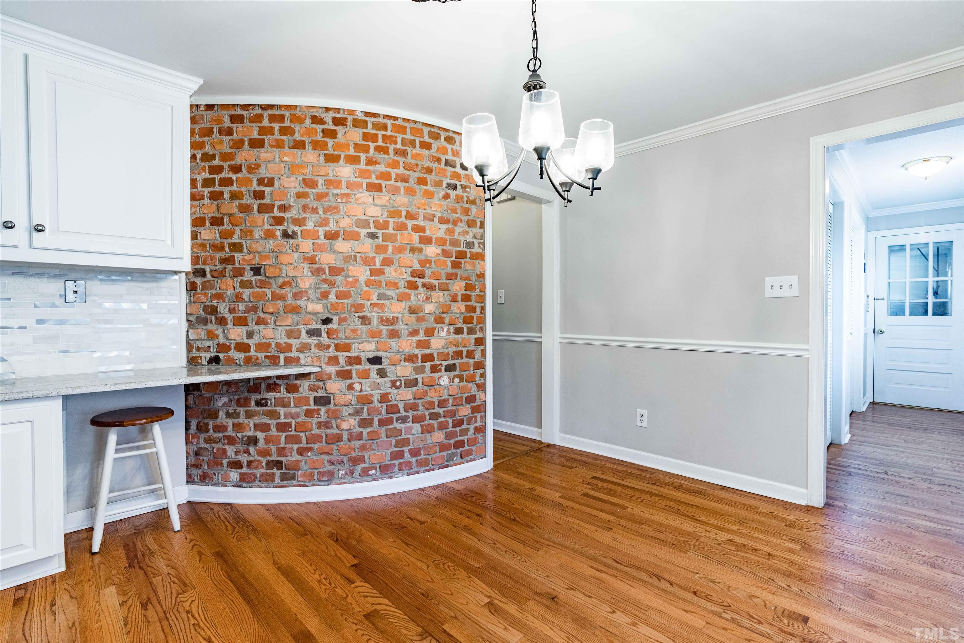 103 Marilyn Circle Cary, NC 27513 - Photo 13 of 64 a view of livingroom with hardwood floor and a ceiling fan
