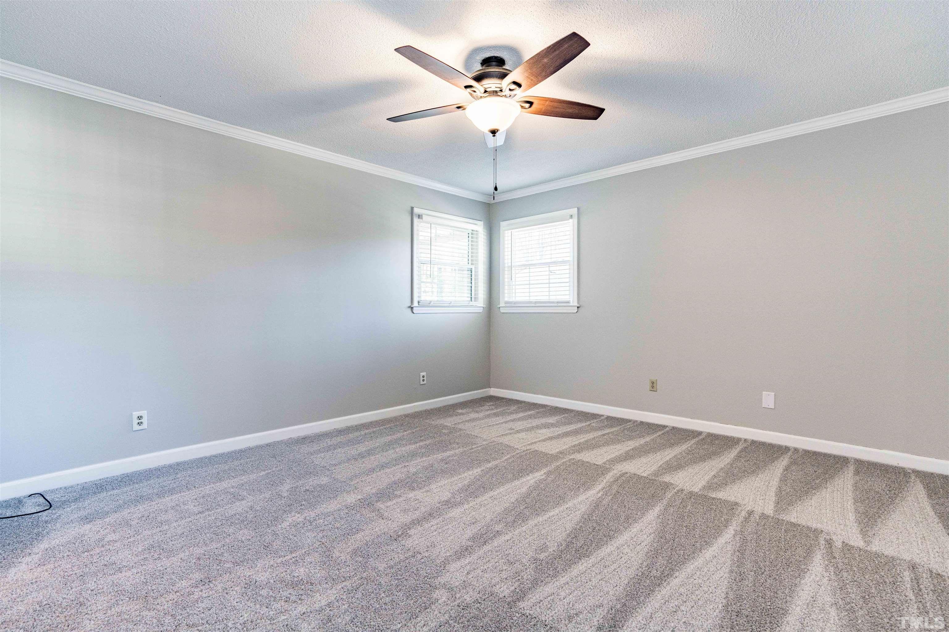103 Marilyn Circle Cary, NC 27513 - Photo 19 of 64 a view of an empty room with a window