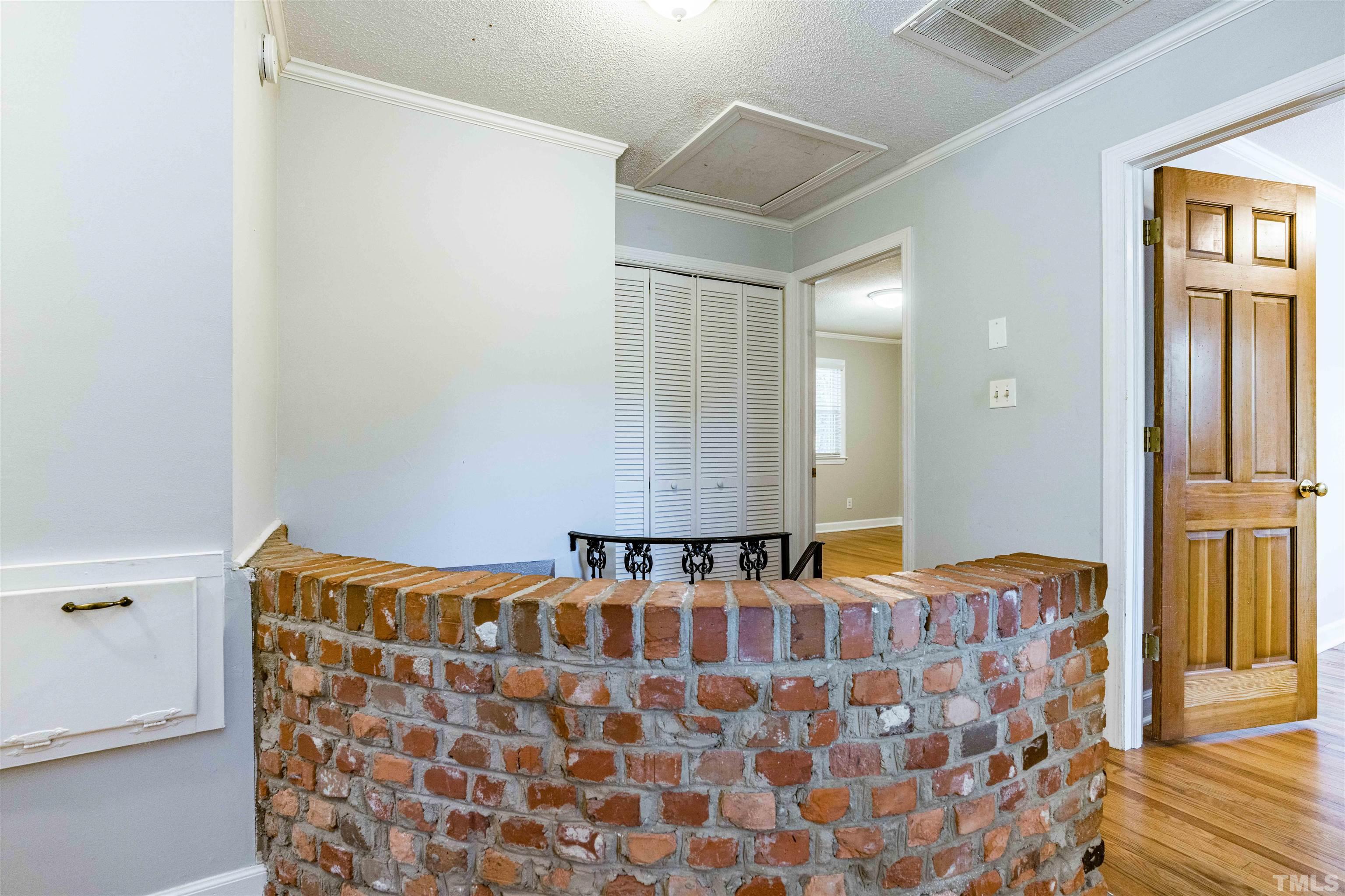 103 Marilyn Circle Cary, NC 27513 - Photo 32 of 64 a bedroom with a bed and wooden floor
