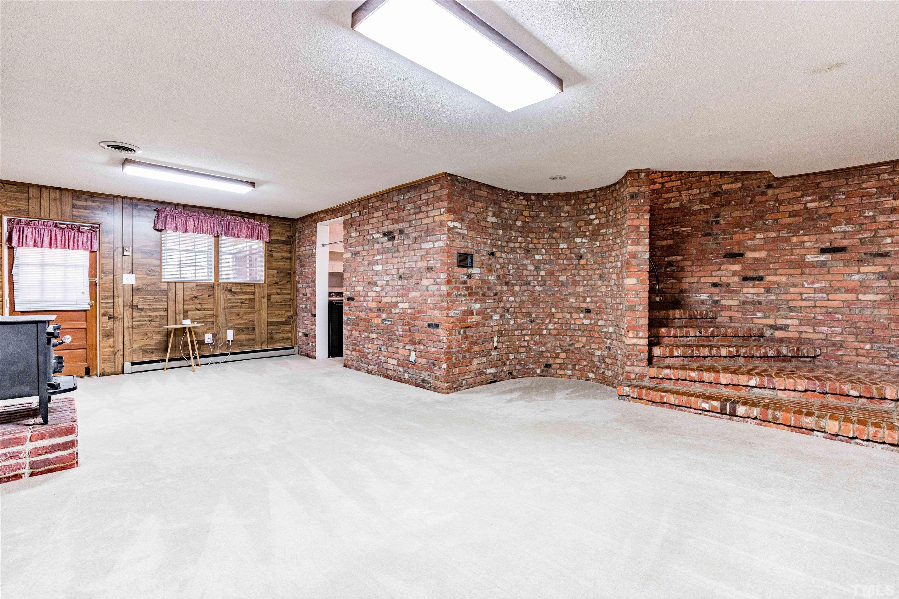 103 Marilyn Circle Cary, NC 27513 - Photo 45 of 64 a view of an empty room