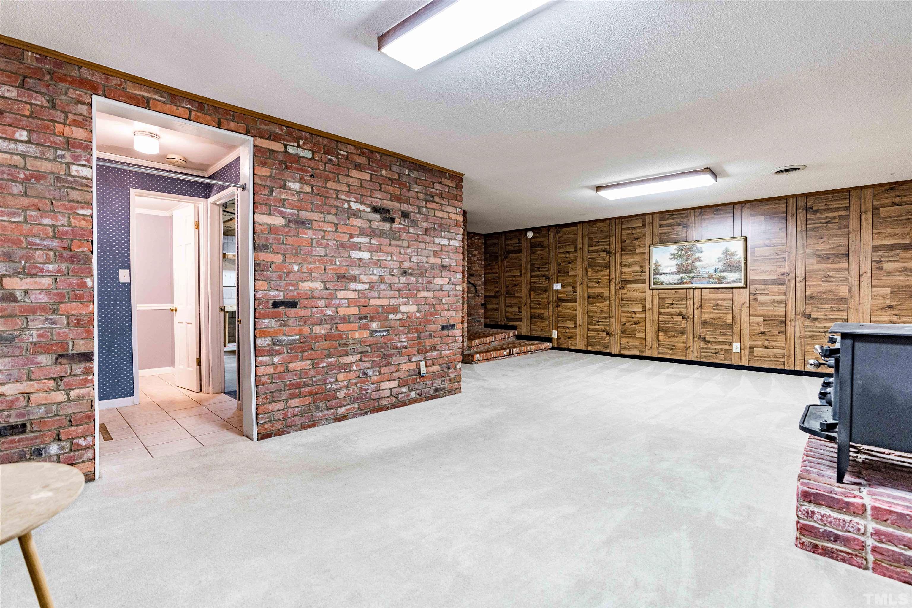 103 Marilyn Circle Cary, NC 27513 - Photo 46 of 64 a view of an empty room with windows