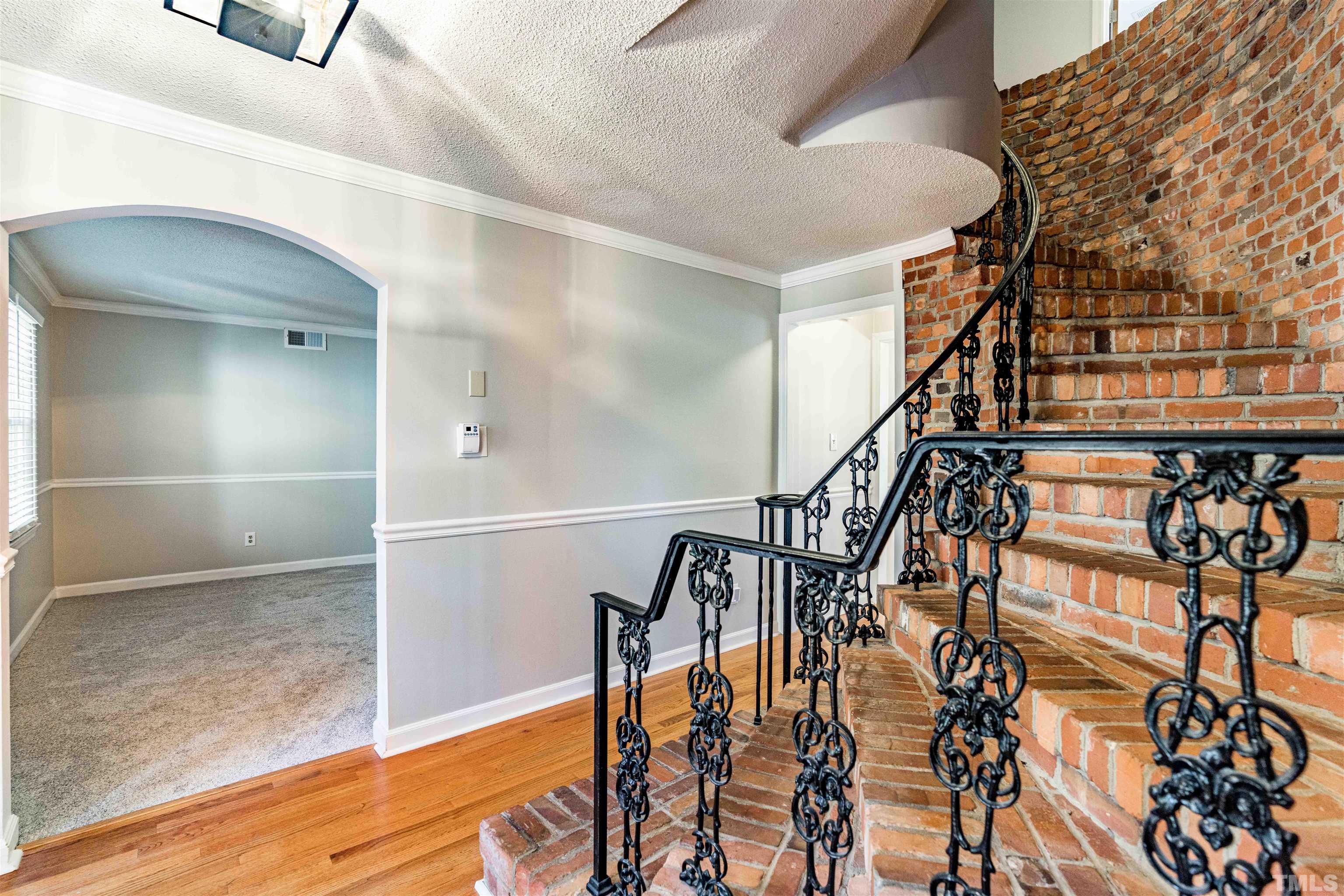 103 Marilyn Circle Cary, NC 27513 - Photo 6 of 64 a view of entryway with wooden floor