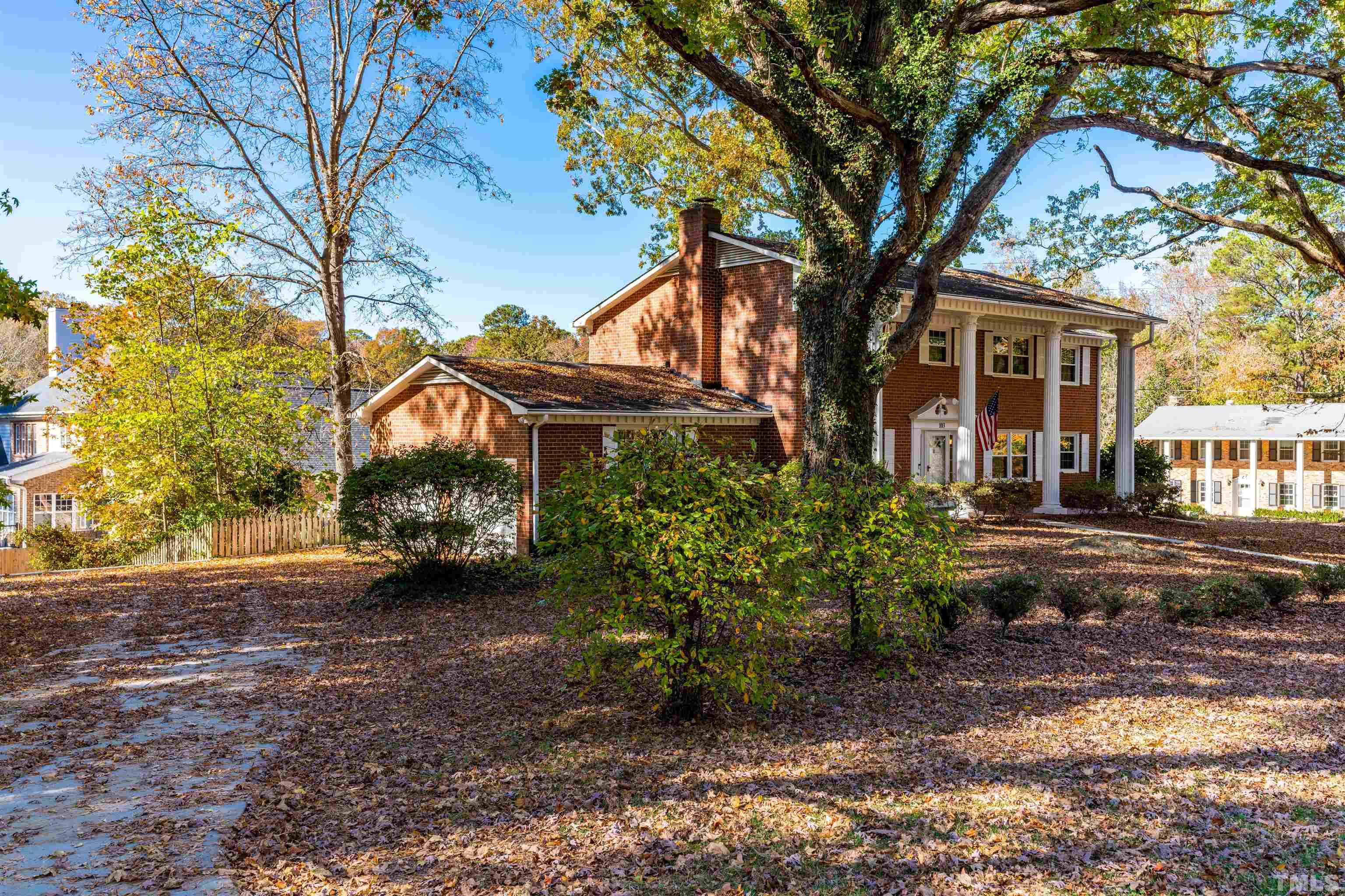 103 Marilyn Circle Cary, NC 27513 - Photo 62 of 64 a view of a house with a yard
