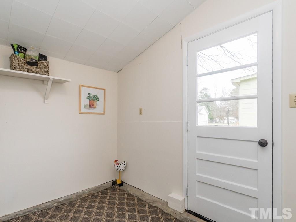 1524 Clermont Road Durham, NC 27713 - Photo 13 of 24 a view of an empty room and window