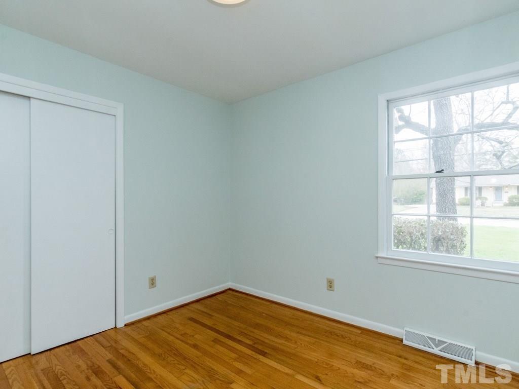 1524 Clermont Road Durham, NC 27713 - Photo 18 of 24 an empty room with a window