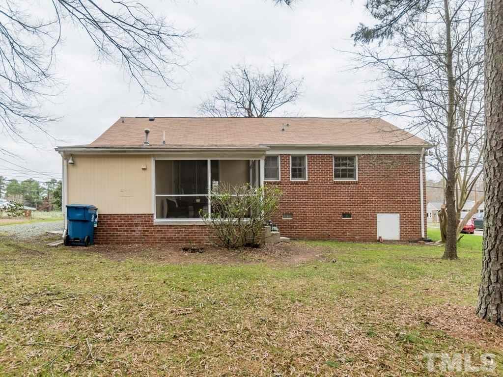 1524 Clermont Road Durham, NC 27713 - Photo 22 of 24 a view of a house with yard and a tree
