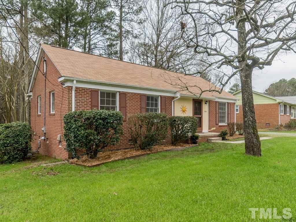 1524 Clermont Road Durham, NC 27713 - Photo 24 of 24 a front view of a house with a garden