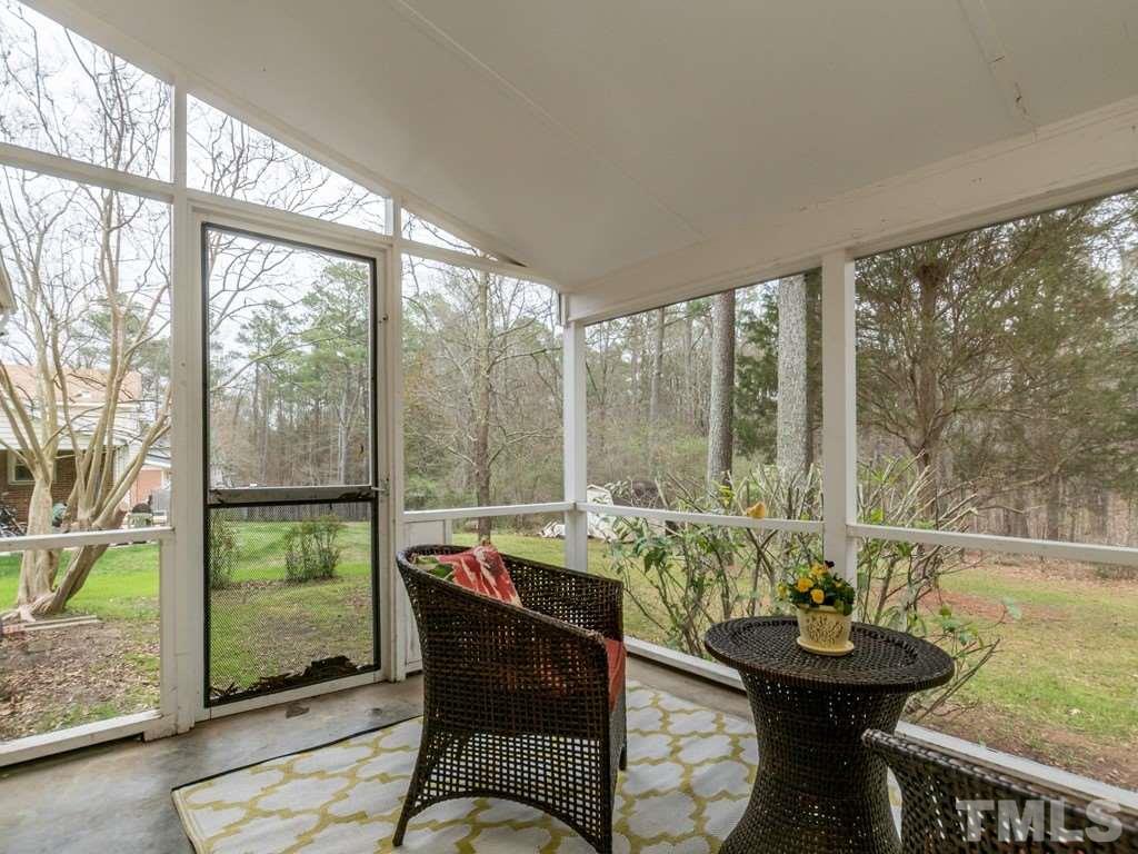 1524 Clermont Road Durham, NC 27713 - Photo 8 of 24 a view of a room with furniture and wooden floor