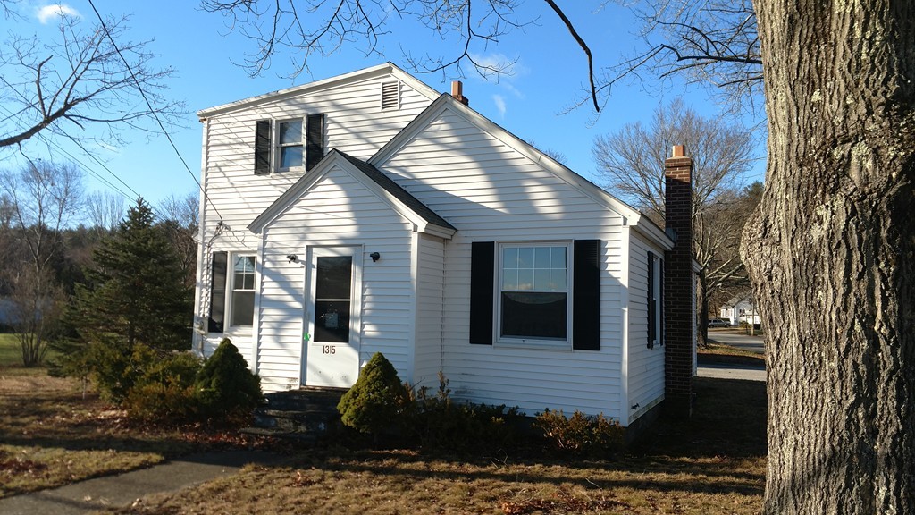 1315 Providence Road Northbridge, MA 01588 - Photo 1 of 11 a front view of a house with a yard