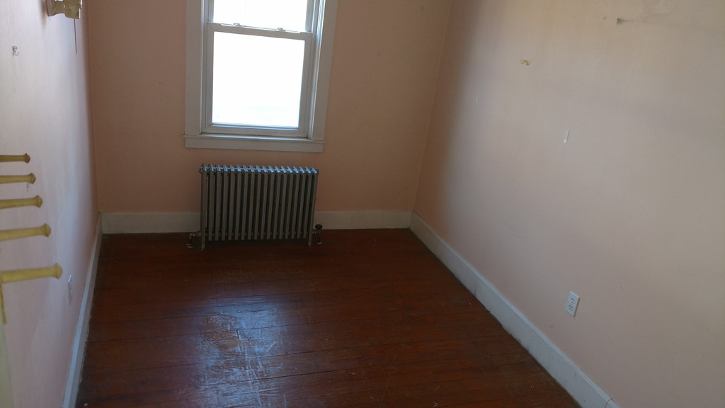 1315 Providence Road Northbridge, MA 01588 - Photo 6 of 11 an empty room with wooden floor and windows
