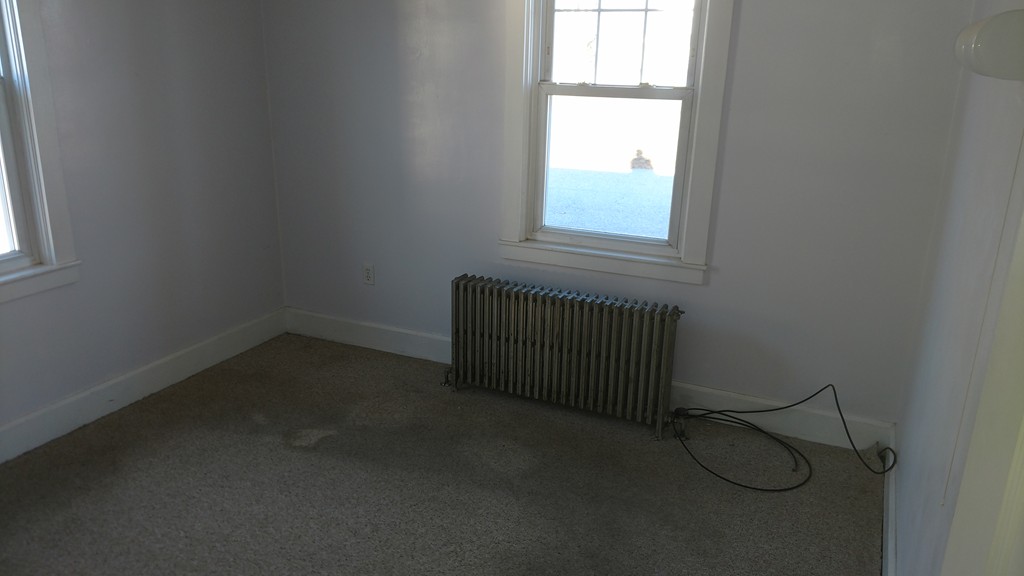 1315 Providence Road Northbridge, MA 01588 - Photo 7 of 11 an empty room with a window