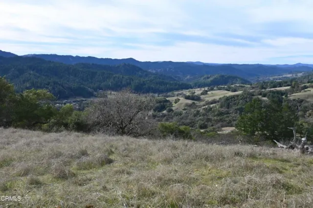 a view of lake with mountain