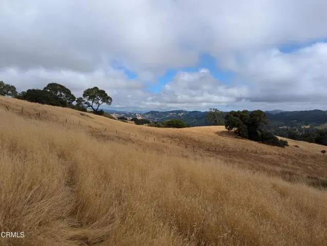 a view of a sky from under an umbrella