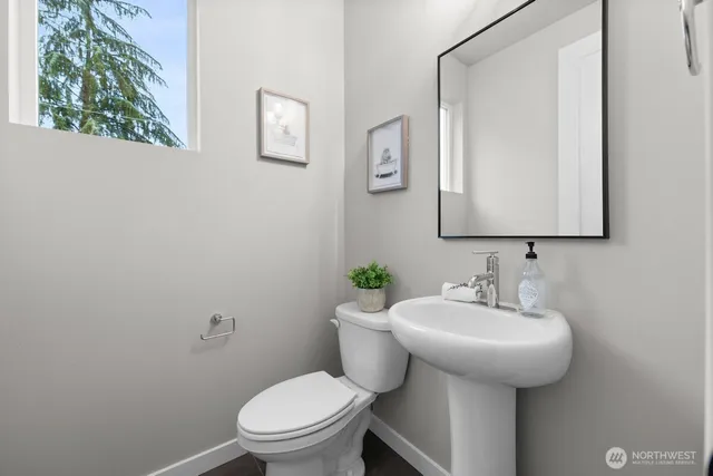 a workspace with furniture and a window