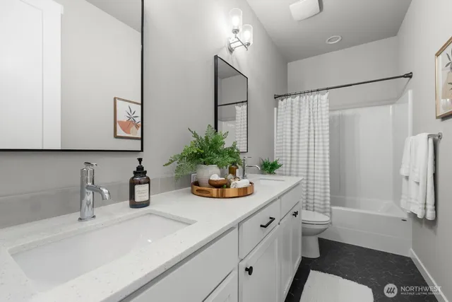 a bedroom with bed and a large window