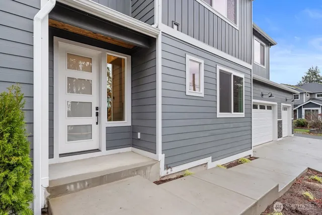 a view of a house with a large window