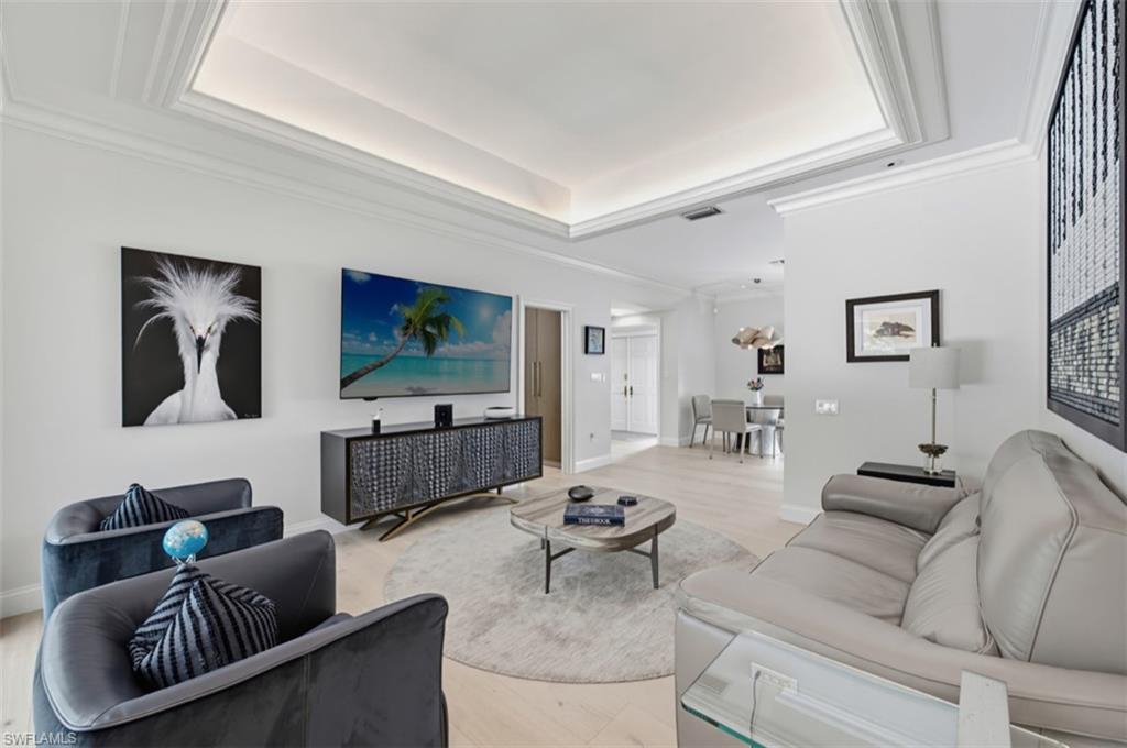 512 Turtle Hatch Road Naples, FL 34103 - Photo 6 of 18 Sitting room accented by tray ceiling and up lighting