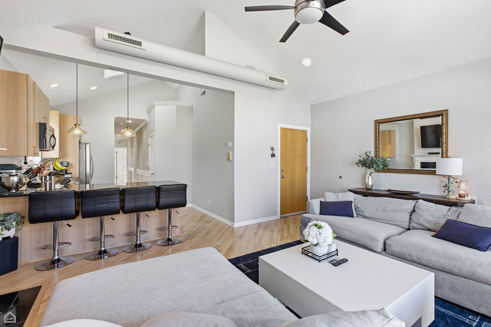 2249 West Foster Avenue, Unit 3 Chicago, IL 60625 - Photo 5 of 19 a living room with furniture and a wooden floor