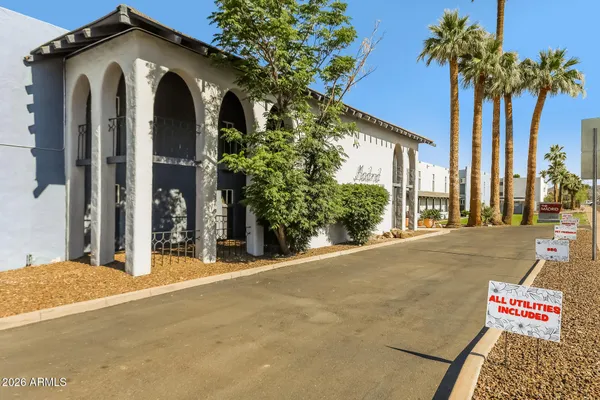 a front view of a house with a garage