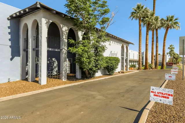 a front view of a house with a garage