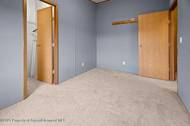 a view of empty room with windows