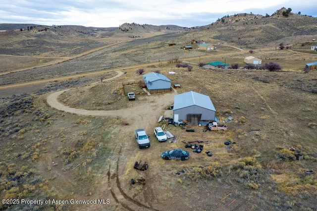 a view of a yard with mountain