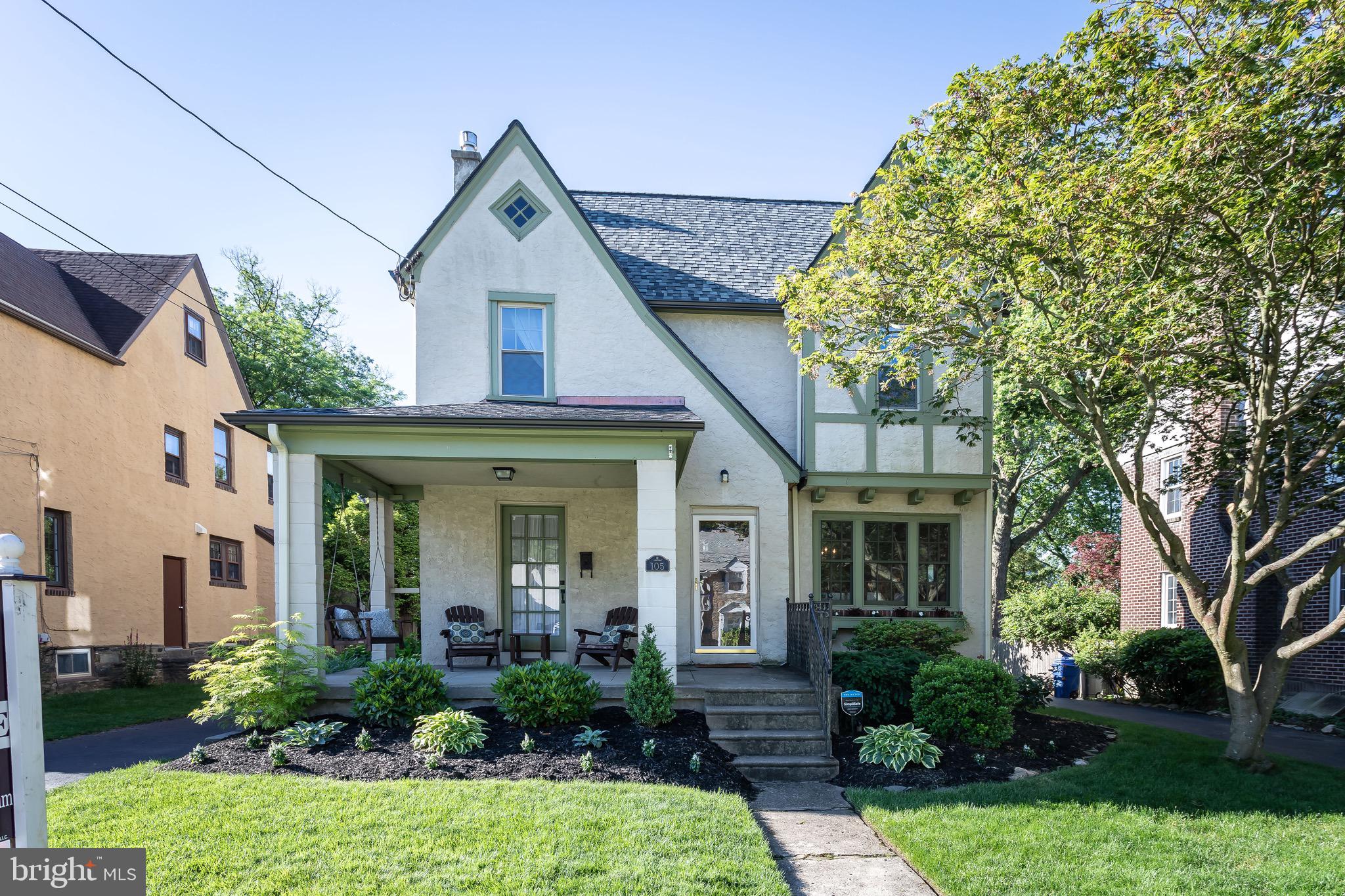 105 West Clearfield Road Havertown, PA 19083 - Photo 1 of 56 a front view of a house with garden