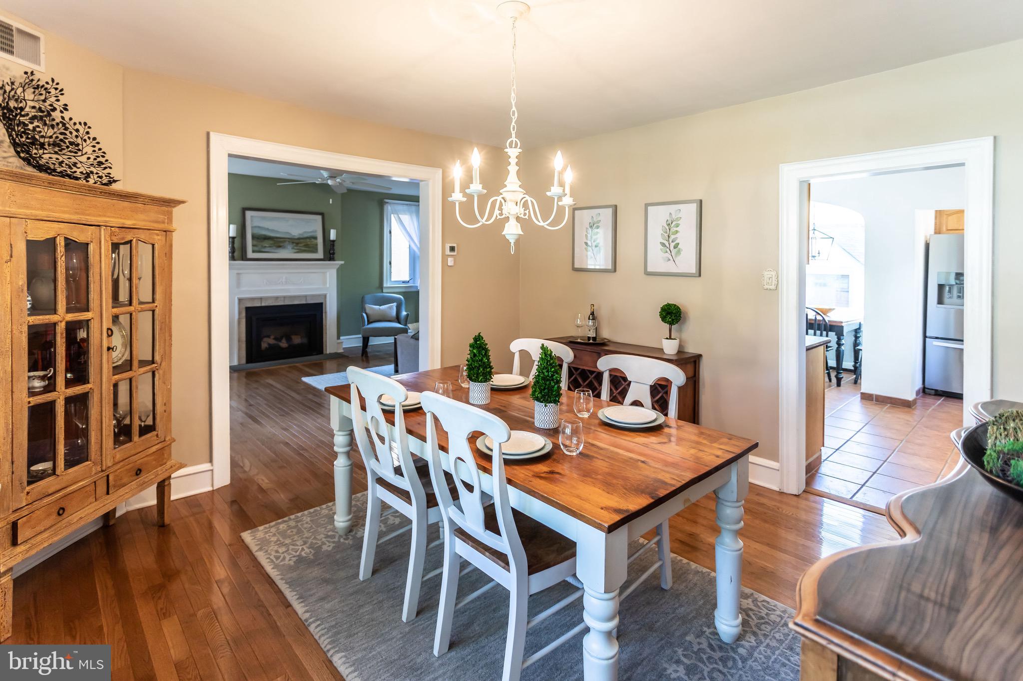 105 West Clearfield Road Havertown, PA 19083 - Photo 17 of 56 a view of a dining room with furniture and wooden floor