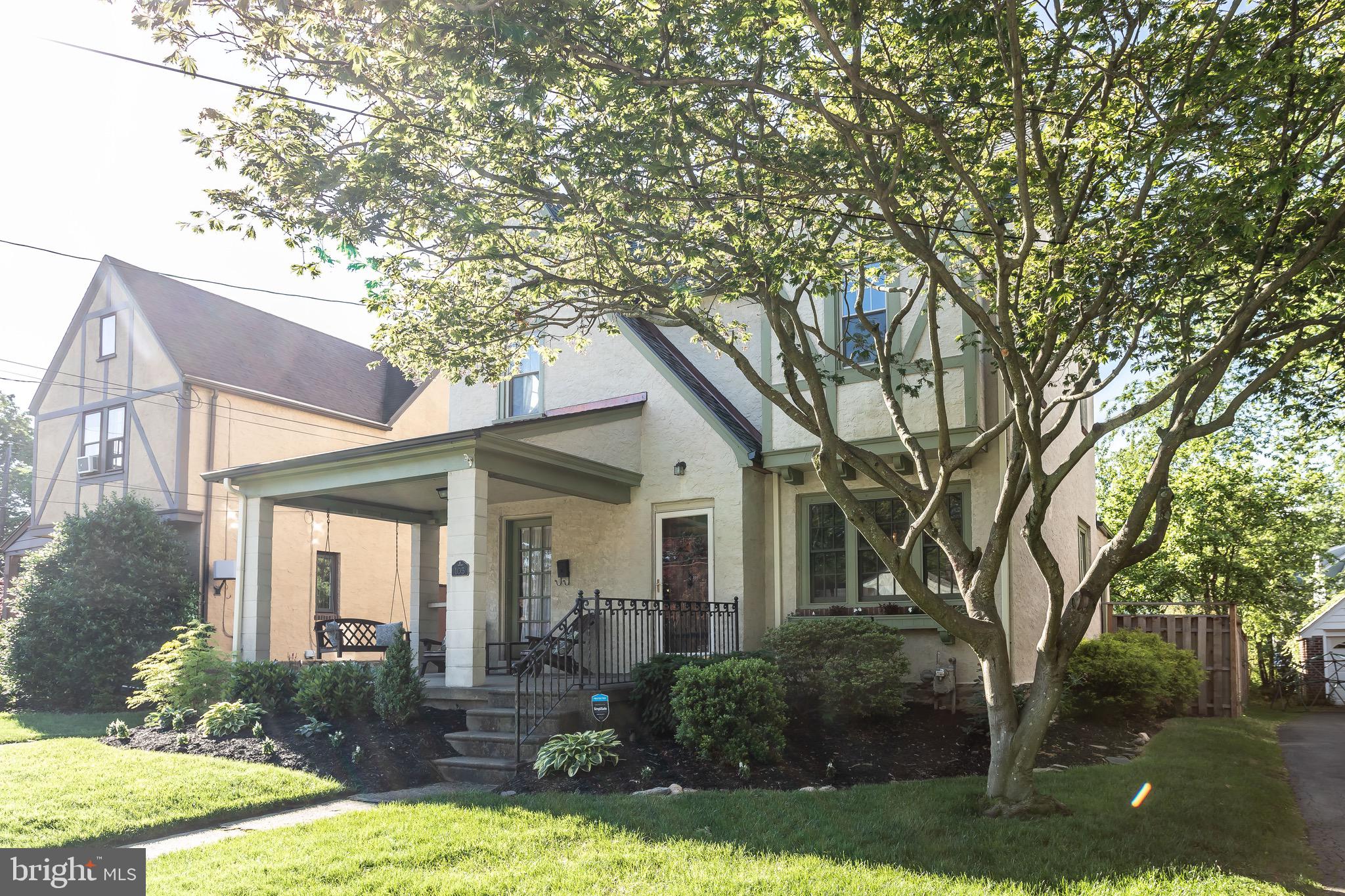 105 West Clearfield Road Havertown, PA 19083 - Photo 3 of 56 a front view of a house with garden