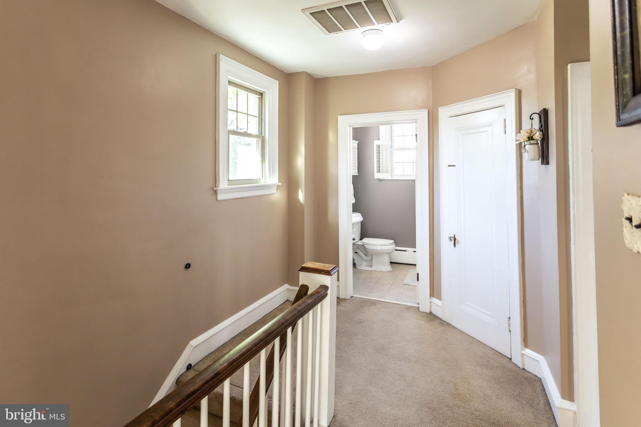 105 West Clearfield Road Havertown, PA 19083 - Photo 26 of 56 a view of a room with wooden floor and a bathroom