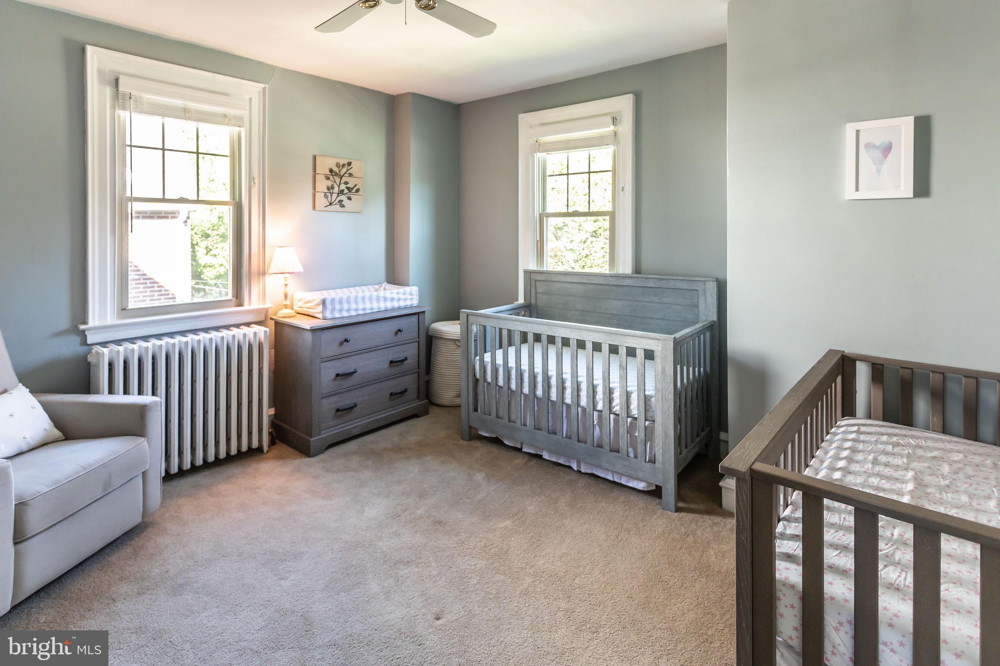 105 West Clearfield Road Havertown, PA 19083 - Photo 32 of 56 a view of a bedroom with furniture and a window