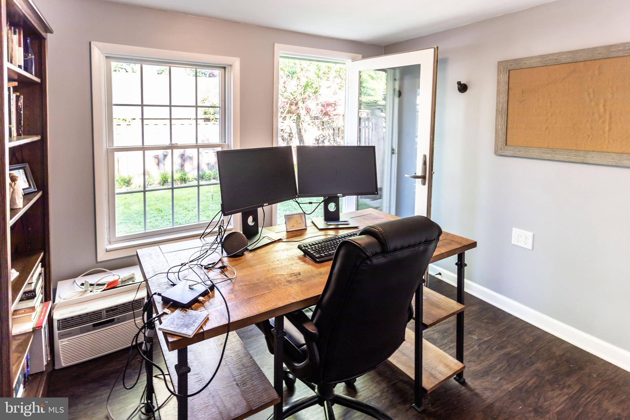105 West Clearfield Road Havertown, PA 19083 - Photo 48 of 56 a view of a workspace with a window and a table in a room